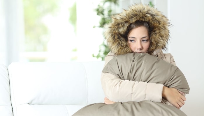 Angry Cold Woman In Home Needs Heating Service